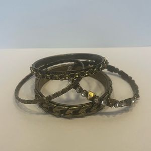 Set of four bronze bangle bracelets